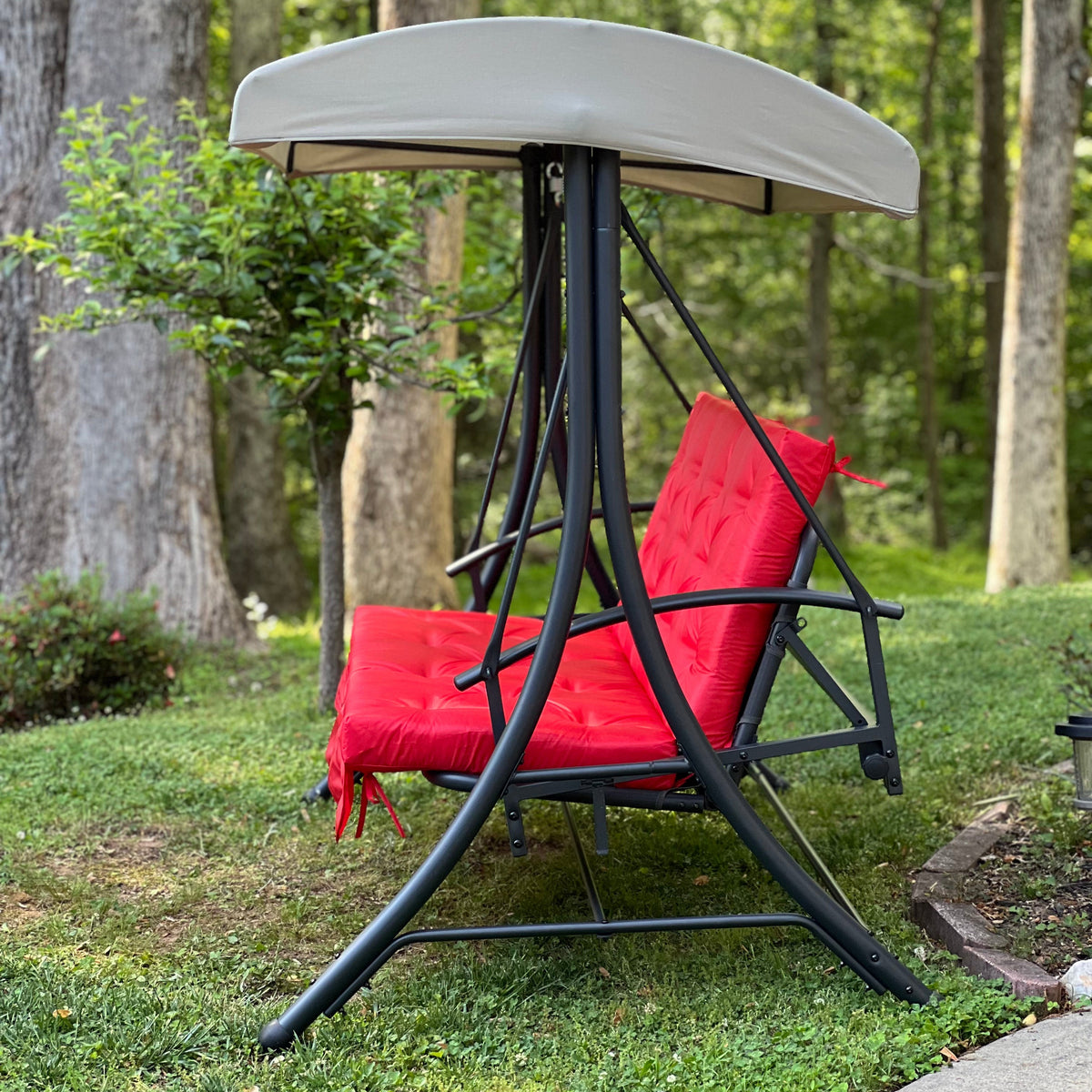 Red Oxford outdoor swing cushion with backrest for porch and patio seating