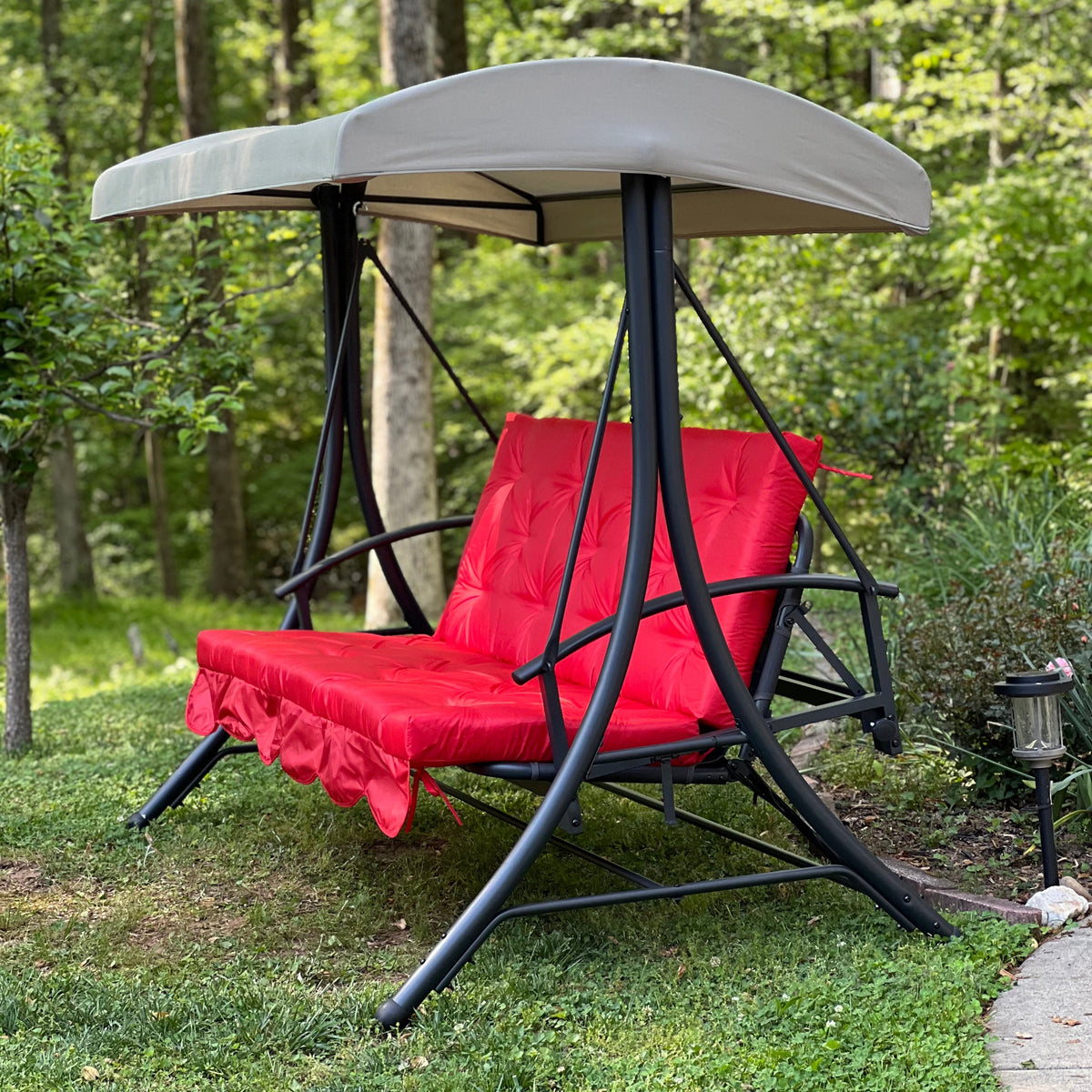 Red Oxford outdoor swing cushion with backrest for porch and patio seating